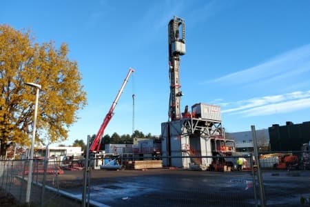 Utilising geothermal energy to power industrial sites